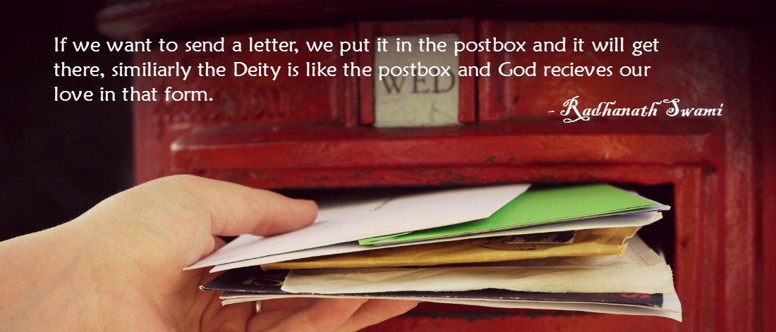 posting many letters to red british postbox on street